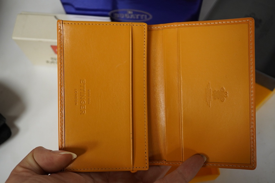 Sundry items comprising, two luxury wallets, boxed, Swiss military lighter and gent's manicure set. Condition - fair
